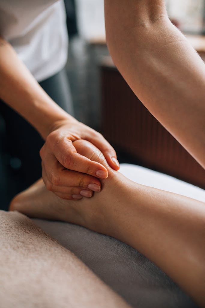 Soothing foot massage in a calm indoor setting, promoting relaxation and self-care.